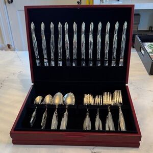 60 piece stainless Cutco flatware set with chest